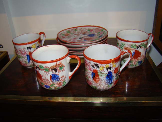 A charming miniature plate rack holding four 19th century Japanese demitasse cups and six saucers — image 2
